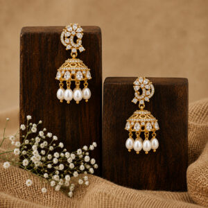 Gold Polished Alloy Jhumka Earrings with Freshwater Pearls